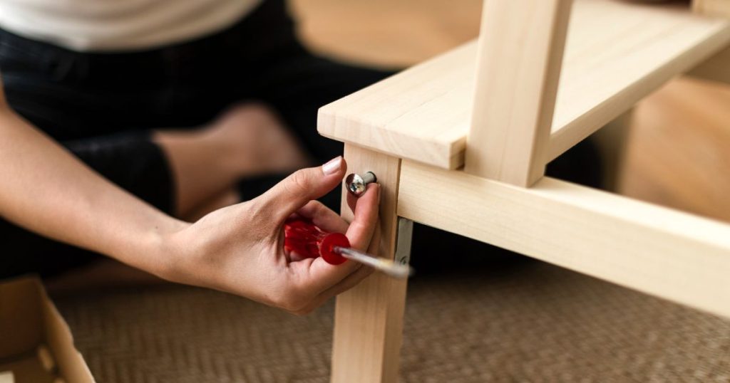 Step by step furniture assembly showing frame being built first